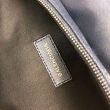 Side profile of modern refined women's handbag – women's premium purse