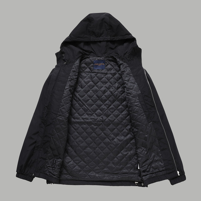 Close-up detail shot of Louis Vuitton luxury clothing with monogram-inspired silhouette
