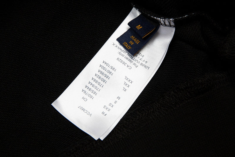 Front view of Louis Vuitton luxury clothing with signature branding