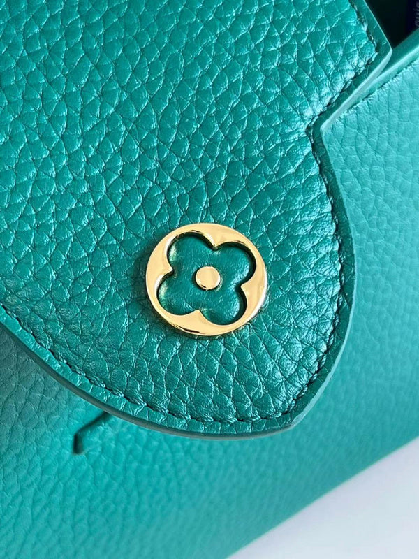 Styled lifestyle shot of refined chic women's handbag – women's luxury handbag