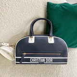 Close-up detail of modern polished women's handbag – women's luxury handbag
