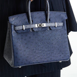 Side view of elegant structured handbag