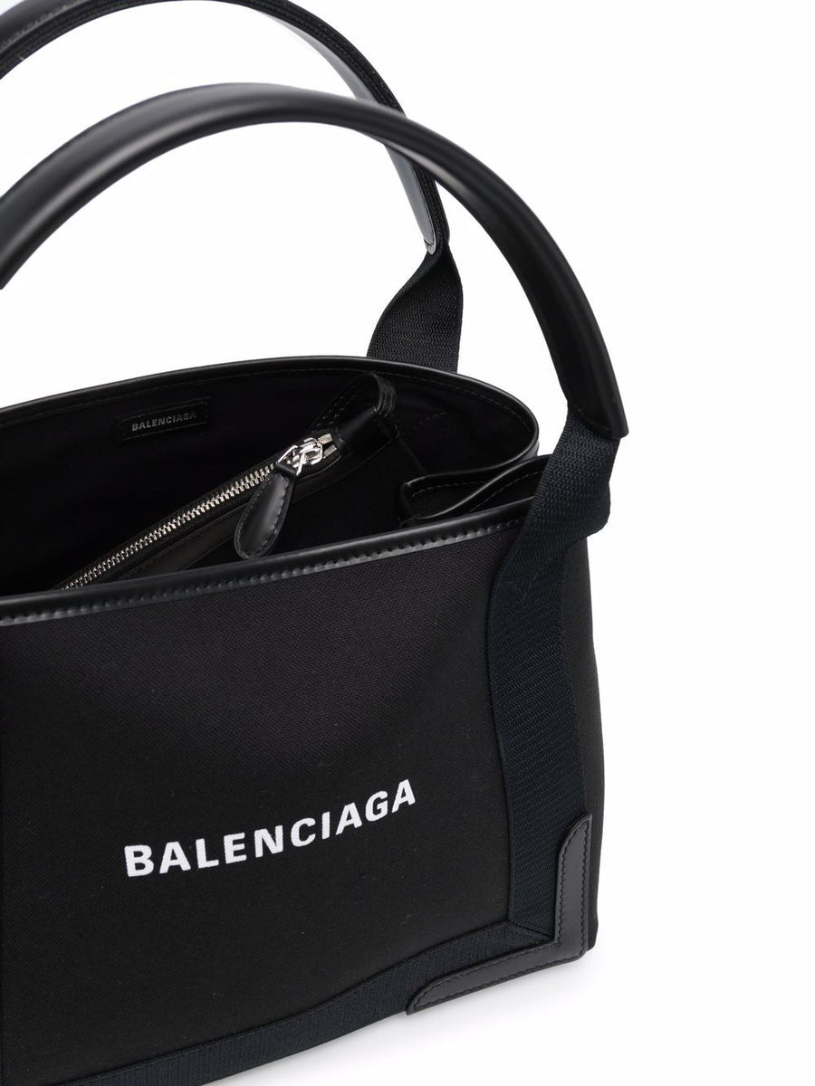 Close-up of Balenciaga totes hardware and fine stitching