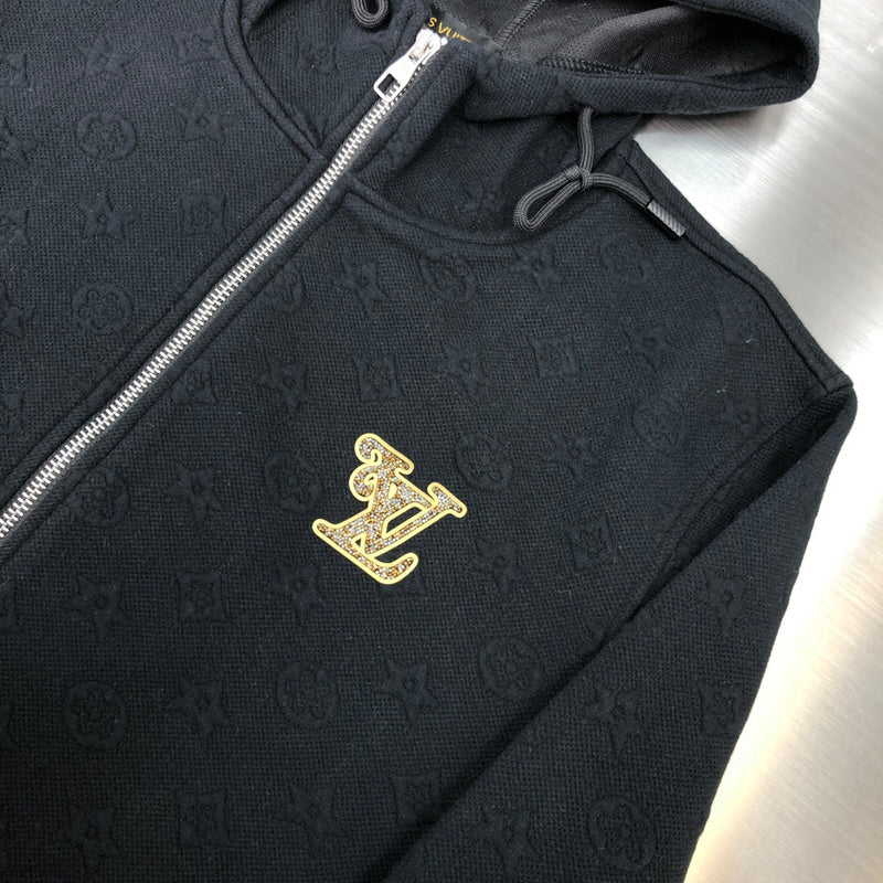 Full styled look of Louis Vuitton luxury clothing with signature branding