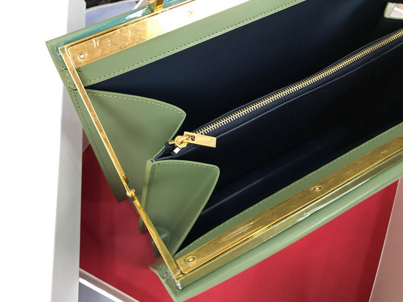Side profile of everyday-luxe structured women's handbag – women's luxury accessory