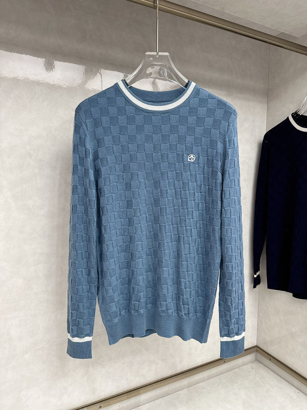 Front view of Louis Vuitton luxury clothing with signature branding