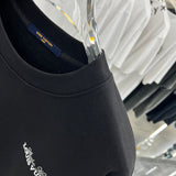 Flat lay presentation of Louis Vuitton luxury clothing with relaxed-fit cut