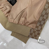 Front view of Gucci luxury clothing with monogram-inspired silhouette