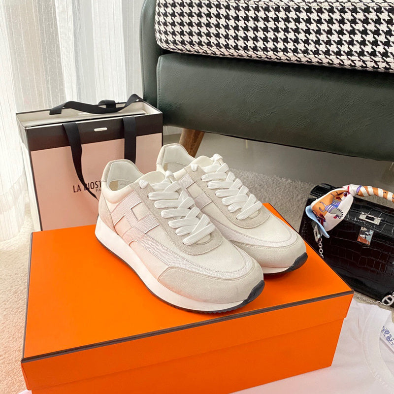 Hermes shoes Style 355 - close-up of statement logo accent