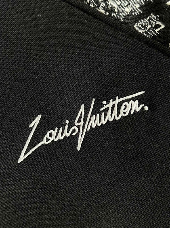Front view of Louis Vuitton luxury clothing with label-forward styling
