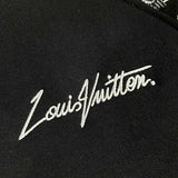 Front view of Louis Vuitton luxury clothing with label-forward styling