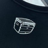 Close-up detail shot of Louis Vuitton luxury clothing with label-forward styling