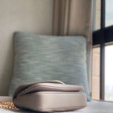 Close-up detail of modern sleek women's handbag – women's statement bag