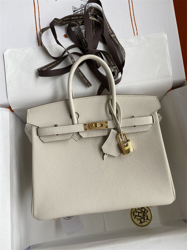 Side view of minimalist structured handbag