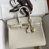 Side view of minimalist structured handbag