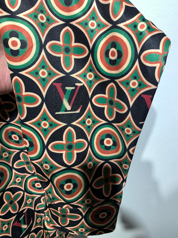 Flat lay presentation of Louis Vuitton cotton t-shirt with signature branding