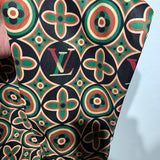 Flat lay presentation of Louis Vuitton cotton t-shirt with signature branding