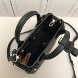 Ziva's Charm handbag – carry view (one versatile size)