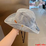 Close-up detail view of Louis Vuitton unisex cap