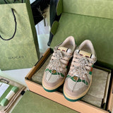 Side profile of Gucci classic monochrome sneakers retro runner design