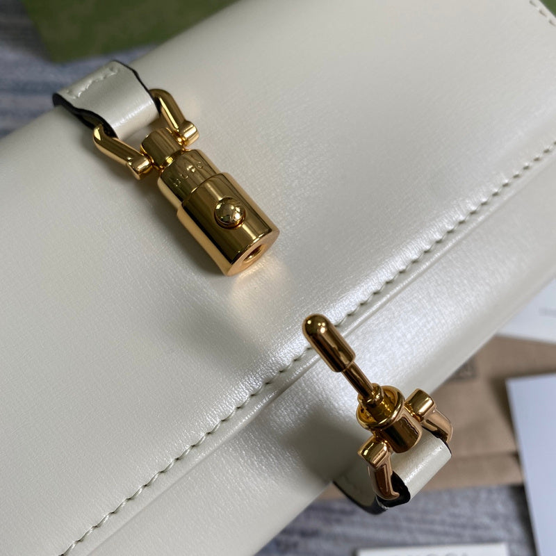 Styled lifestyle shot of chic classic women's handbag – women's luxury handbag