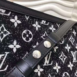 Handle and strap detail of everyday-luxe chic women's handbag – women's luxury accessory