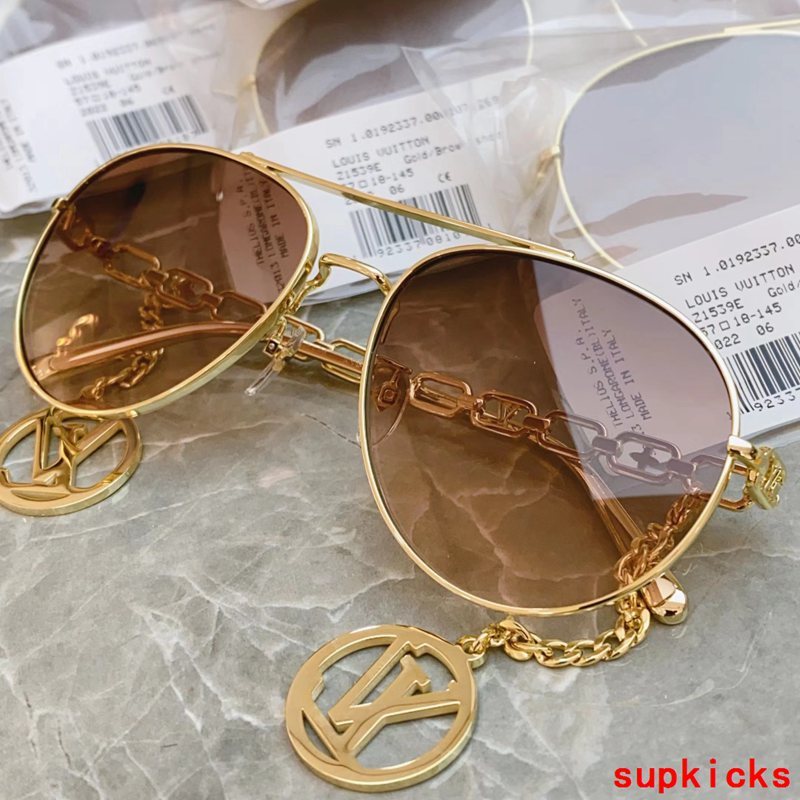 Close-up detail view of Louis Vuitton unisex sunglasses