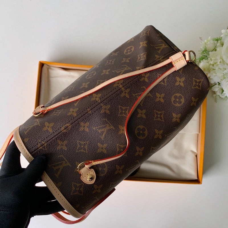 Side profile of classic chic women's handbag – women's luxury accessory