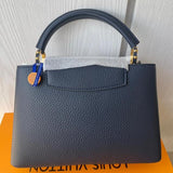 Handle and strap detail of premium refined women's handbag – women's luxury handbag