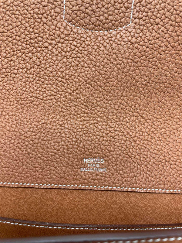  refined top-handle bag styled with outfit 18