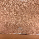  refined top-handle bag styled with outfit 18