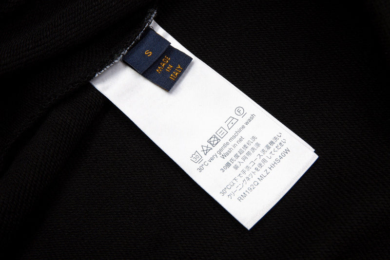 Side profile of Louis Vuitton luxury clothing with monogram-inspired silhouette