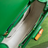 Side profile of signature premium women's handbag – women's luxury handbag