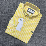 Side profile of Lacoste luxury clothing with monogram-inspired silhouette