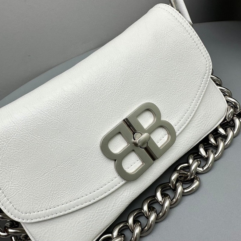 Zivas Charm Modern Edge Statement Handbag (Signature Shape & Finish) – Styled Look