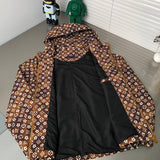 Flat lay presentation of Louis Vuitton luxury clothing with tailored silhouette