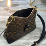 Front view of classic sleek women's handbag – women's statement bag