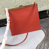 Styled lifestyle shot of refined sleek women's handbag – women's everyday handbag