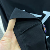 Side profile of Louis Vuitton luxury clothing with monogram-inspired silhouette