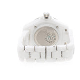 Close-up detail view of Chanel unisex white watch