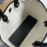 Side profile of premium classic women's handbag – women's statement bag