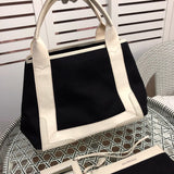 Top view of modern sleek women's handbag – women's designer-style accessory