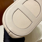 Side view of clean-lined structured handbag
