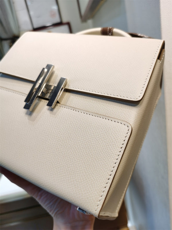  Refined carryall bag carried on shoulder