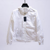 Full styled look of Louis Vuitton luxury clothing with label-forward styling