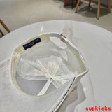 Side view of Louis Vuitton unisex cap