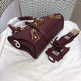 Front view of everyday-luxe sleek women's handbag – women's statement bag