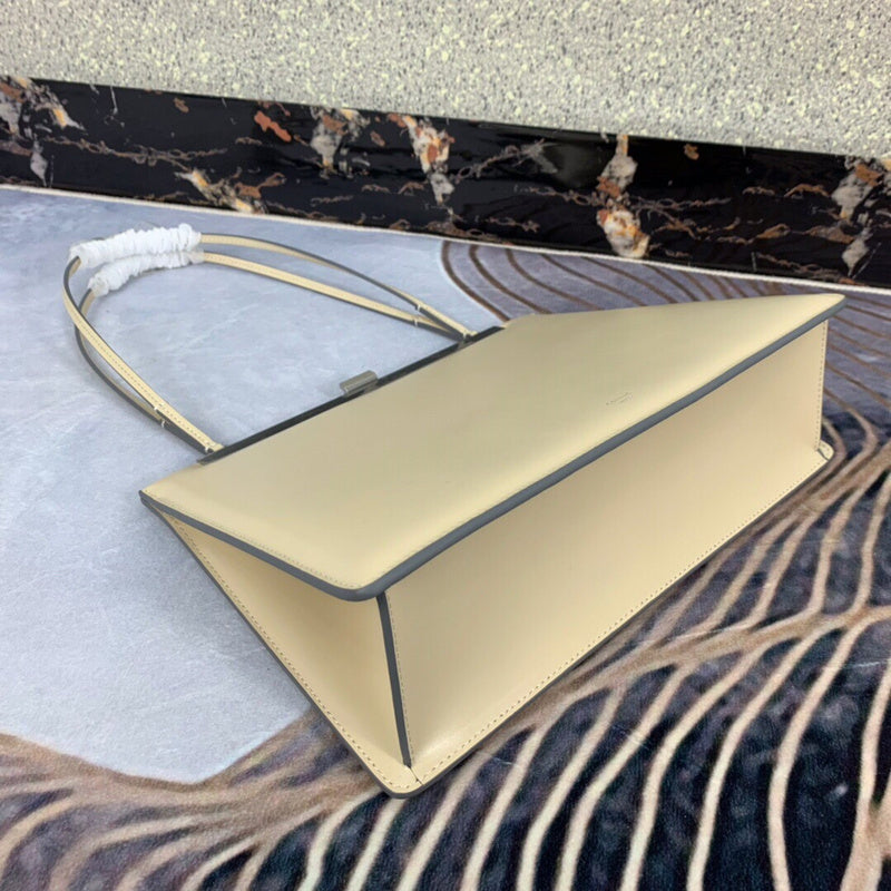 Top view of sleek modern women's handbag – women's luxury accessory