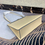 Top view of sleek modern women's handbag – women's luxury accessory