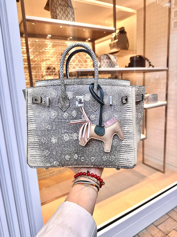 Side view of understated structured handbag